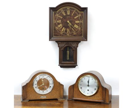 Two similar 1930s oak cased three train mantel clocks, one stamped Garrard to the back plate; together with Metamec battery m