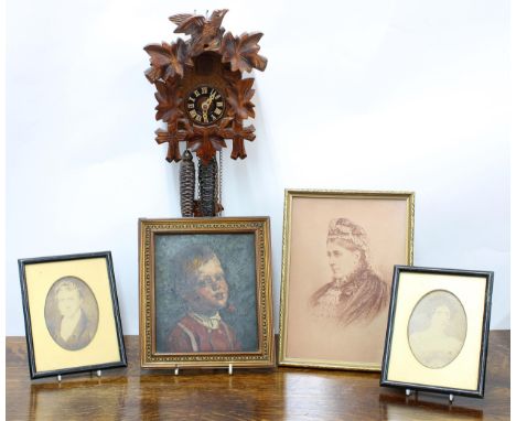 Carved Black Forest type cuckoo wall clock, 9" high (with pendulum and two weights); together with four small portrait pictur