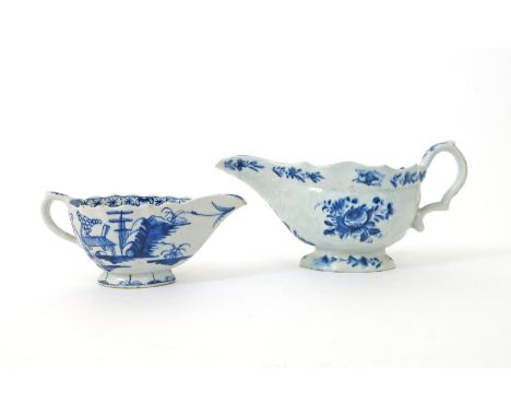 Two Bow blue and white sauceboats, c.1760, the larger painted with rose sprays within moulded panels, the smaller fluted and 