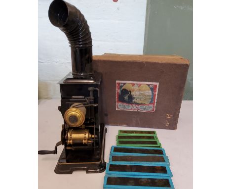 A late 19th century German small magic lantern by Ernst Plank of Bavaria, boxed;&nbsp; with slides 