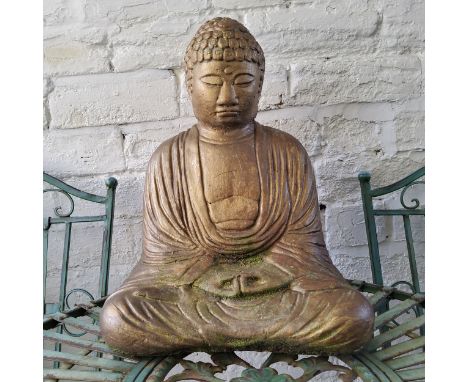 A reconstituted stone Buddha garden statue 