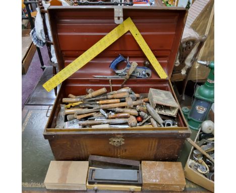 Tools - An early 20th century metal travel trunk with scumbled wood finish full of tools, including wood chisels, rules, file