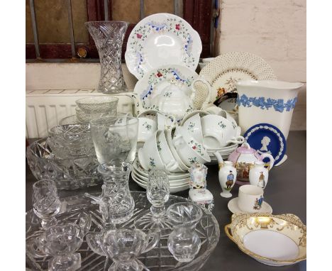 A Victorian Staffordshire porcelain tea service, for twelve, decorated with stylised flowers and foliage, c.1890;&nbsp;&nbsp;