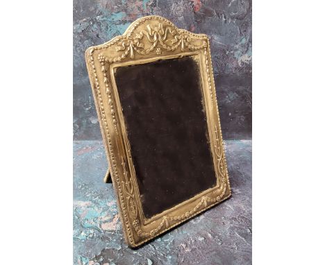 A silver arched rectangular easel photograph frame, embossed with ribbon tied husk swags,&nbsp; 24cm x 16cm, Sheffield 1995 