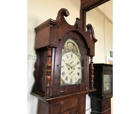 A 19th century mahogany cased North Country long case clock with broken scrolled pediment above an arched glazed door flanked