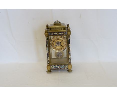 A 19th century ormolu and champlevé enamel four glass clock by Marti et Cie Paris with galleried top, enamel decorated pilast