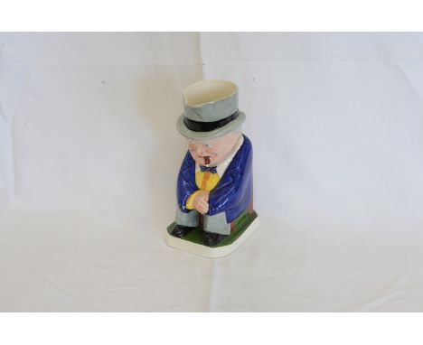 A Copelands Spode Toby jug depicting Winston Churchill wearing a blue overcoat, yellow waistcoat and white shirt. Est £30-50