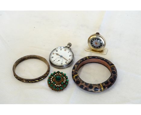 A quantity of costume jewellery including a military issue pocket watch, brooches, a silver ribbon form brooch etc.  Est £20-