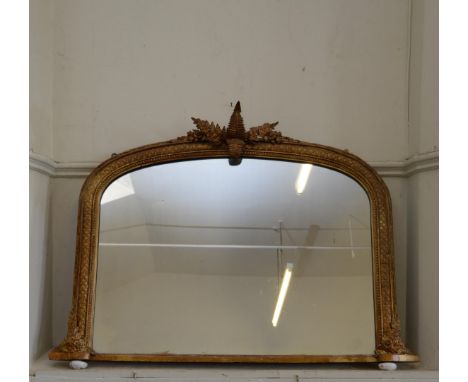 A 19th century gilt framed overmantel mirror with fern decorated pediment.  48ins wide.  Est £70-100