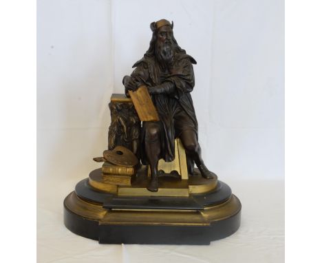 A 19th century bronze figure depicting a seated scholar leaning on a pedestal whilst holding a gilt tablet with an artist’s e