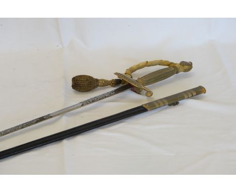 A King George VI ceremonial sword and scabbard.  Est £40-60