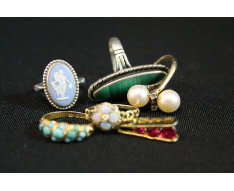 VICTORIAN RINGS - A 15ct Victorian turquoise set ring together with an opal and diamond set pierced yellow metal ring.  Also 