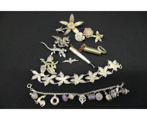 SILVER FILIGREE - MARCASITE -  A silver marcasite dragon brooch (1 stone missing), ring and two further brooches.  Filigree b