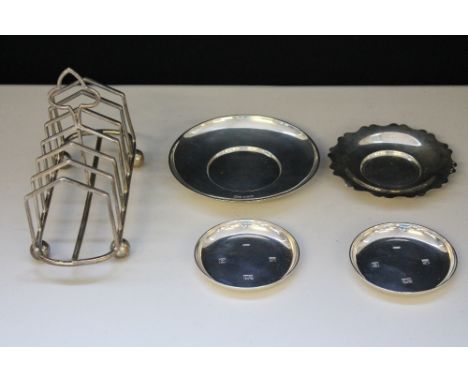 SAUCERS - a collection of x4 silver coasters and a Maplin and Webb silver toast rack to include Sheffield and Birmingham hall