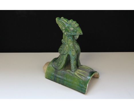 CHINESE ROOF/RIDGE TILE – with green glaze in the form of a PHOENIX.  29cm high by 25cm wide. 