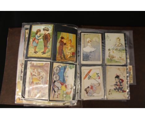 POSTCARDS - CHILDREN - A Postcard Album containing over 150 postcards, also to include Victorian scraps, real photographs and