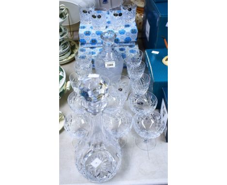 Glassware - a cut glass decanter; stemware to include champagne coupe; others