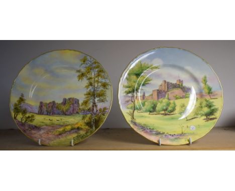 A pair of Royal Worcester cabinet plates, painted with Bothal Castle and Oystermouth
