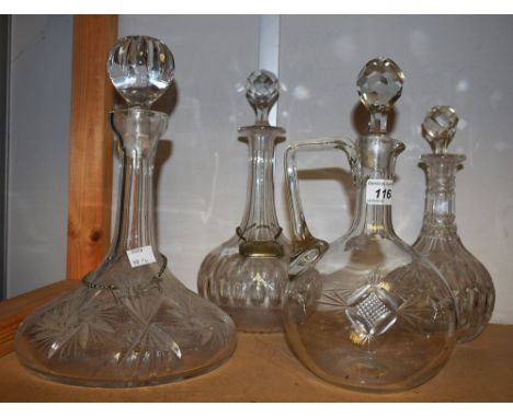 A 19th century cut glass ships decanter with Port lable; a decanter with Sherry label; two other 19th century decanters