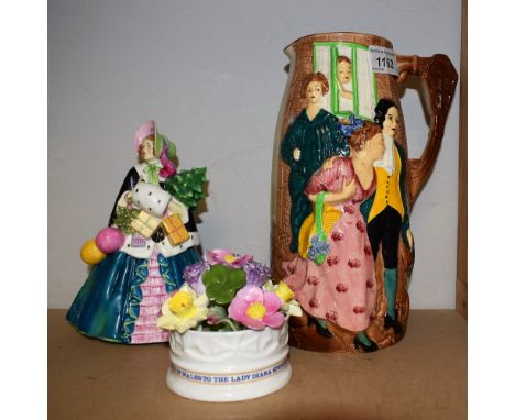 A Royal Worcester figure, noel 2905; a Burleigh Ware Sally-in-our-Alley jug; a floral Royal Wedding 1981 group (3) 