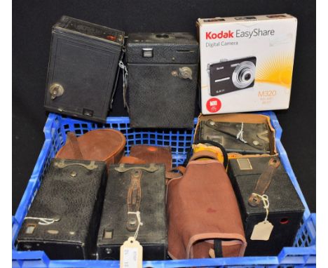 Photography - A Kodak Six-20 Brownie C box camera, box; A Kodak Brownie 127 camera, plastic case; a Kodak Brownie Cresta II c