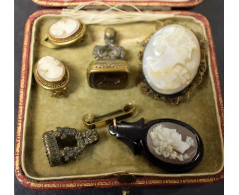 Jewellery - a 19th century portrait cameo pendant brooch, black frame, base metal bar;  another scrolling frame;  a pair of c