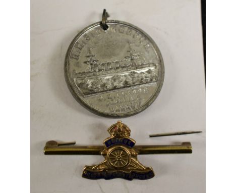 An enamel Royal Artillery sweetheart brooch; HMS Powerful commemorative medallion, 1895