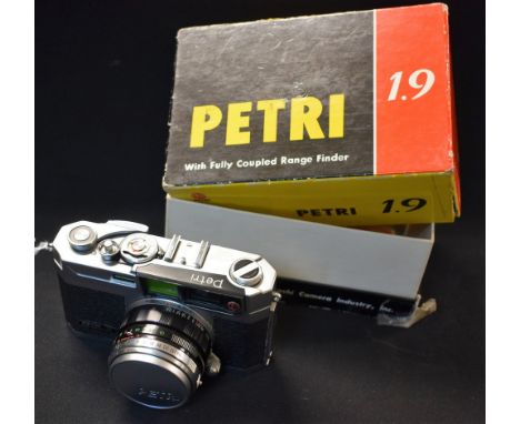 Photography - A Kuribayashi Petri 1.9 Colour Corrected Super 35mm camera, Orikkor f1.9 4.5cm lens, original box; A Johnson St
