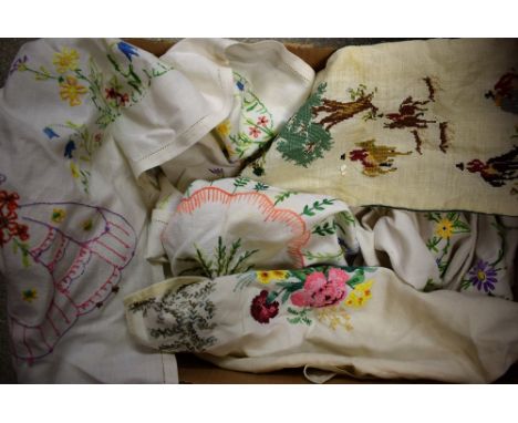 Textiles - hand embroidered linen table cloths including crinoline lady. English country garden flowers, etc