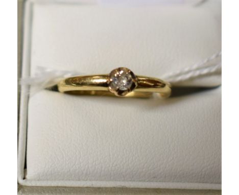 A diamond solitaire ring, oval mixed cut diamond approx 0.13ct, 18ct gold shank, stamped 18, size O, 2.3g gross