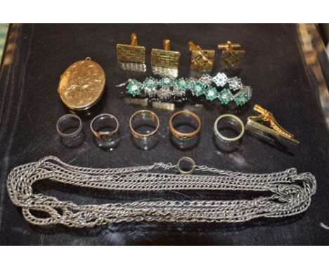 A gold plated locket; a 9ct gold openwork ring; a marcasite ring; a metal chain; a pair of cuff links; another; a tie pin; a 