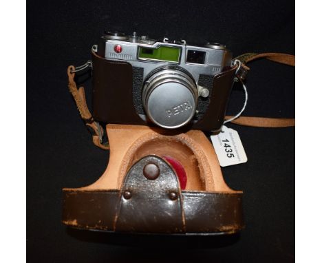 Photography - A Kuribayashi Petri 2.8 Colour Super 35mm camera, Orikkor f2.8 4.5cm lens, leather case c.1958.