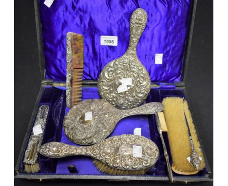 An Edwardian matched silver vanity set, cased; others, button hook, moustache brush, etc