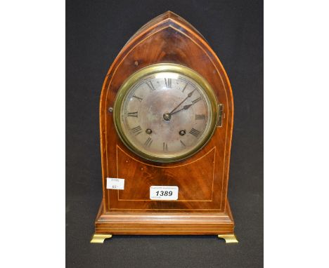 An Edwardian mahogany inlaid lancet top clock