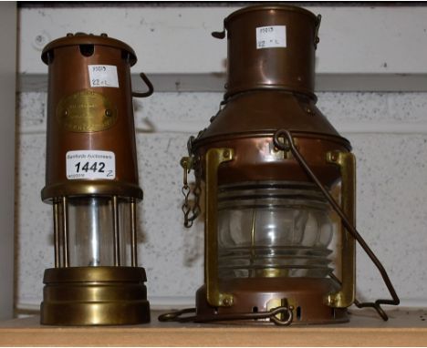 A brass and copper miners lamp; a ship's lamp (2)