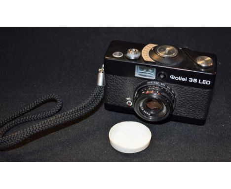 Photography - A Rollei 35 LED 35 mm camera, Triotar f3.5 40mm lens Condition Report: Shutter release knob is loose