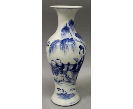 A 19TH CENTURY CHINESE BLUE & WHITE PORCELAIN VASE, painted with a scene of ladies and children in a fenced garden setting, t