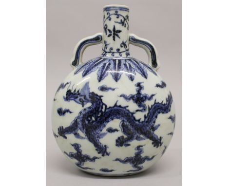 A CHINESE MING STYLE BLUE & WHITE PORCELAIN DRAGON FLASK, the base with a six-character Xuande mark, 5.75in wide at widest po