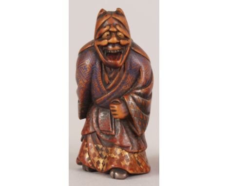 A RARE SIGNED JAPANESE EDO PERIOD PAINTED BOXWOOD NETSUKE OF A NOH ACTOR BY NAGAMACHI SHUZAN, the actor wearing a Hannya mask