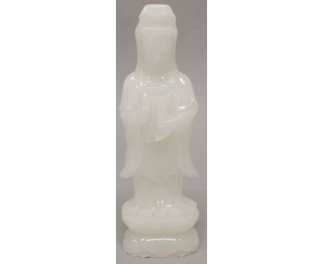 A CHINESE WHITE JADE-STYLE FIGURE OF GUANYIN, 9.7in high.