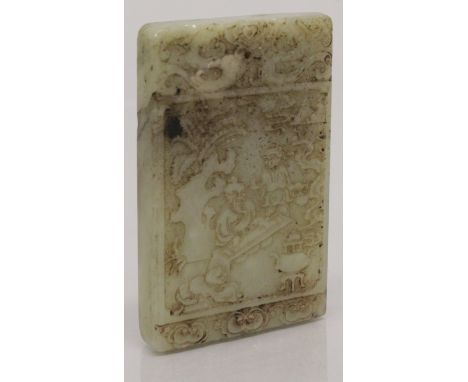 A CHINESE CELADON JADE LIKE RECTANGULAR PENDANT, 2.6in x 1.7in.