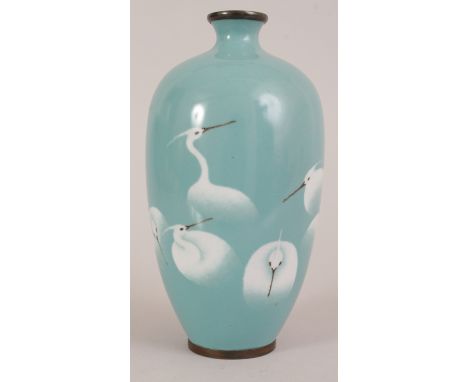 A JAPANESE TURQUOISE GROUND MUSEN CLOISONNE ENAMEL VASE, decorated in wireless white enamel with a gathering of egrets, their