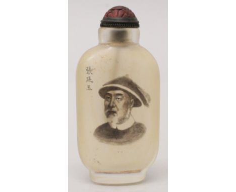 A CHINESE INTERIOR DECORATED GLASS SNUFF BOTTLE, decorated with calligraphy and a portrait of a notable man, 3.1in high.