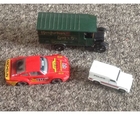 Model collection includes Corgi MacFarlane Lang and Co Biscuits van, Porsche racing car and Police Van unboxed. Good conditio