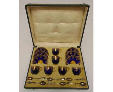 Royal Worcester a cased set of six coffee cup, saucers and hallmarked silver coffee spoons