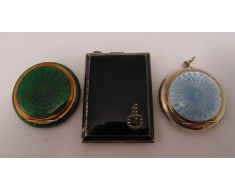 A circular hallmarked silver and enamel powder box, another similar and a ladies hallmarked silver and enamel cigarette case