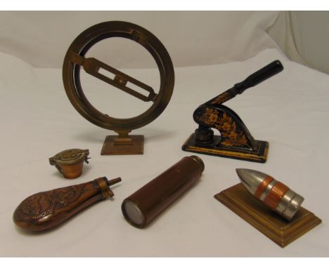 A quantity of collectables to include a powder flask, a naval telescope, a seal and paperweights (6)