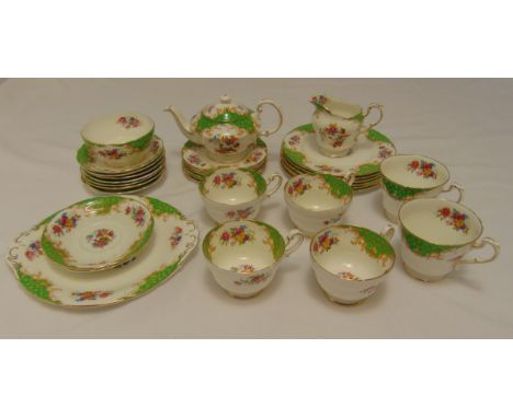 A quantity of Paragon Rockingham to include plates, cups, saucers, teapot, milk jug and sugar bowl (26)