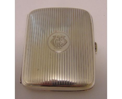 A hallmarked silver engine turned cigarette case, approx total weight 93g