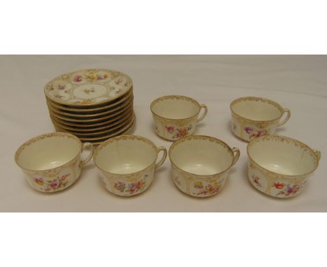 Dresden teaset for six place settings to include cups and saucers, the sides decorated with floral sprays, two cups A/F